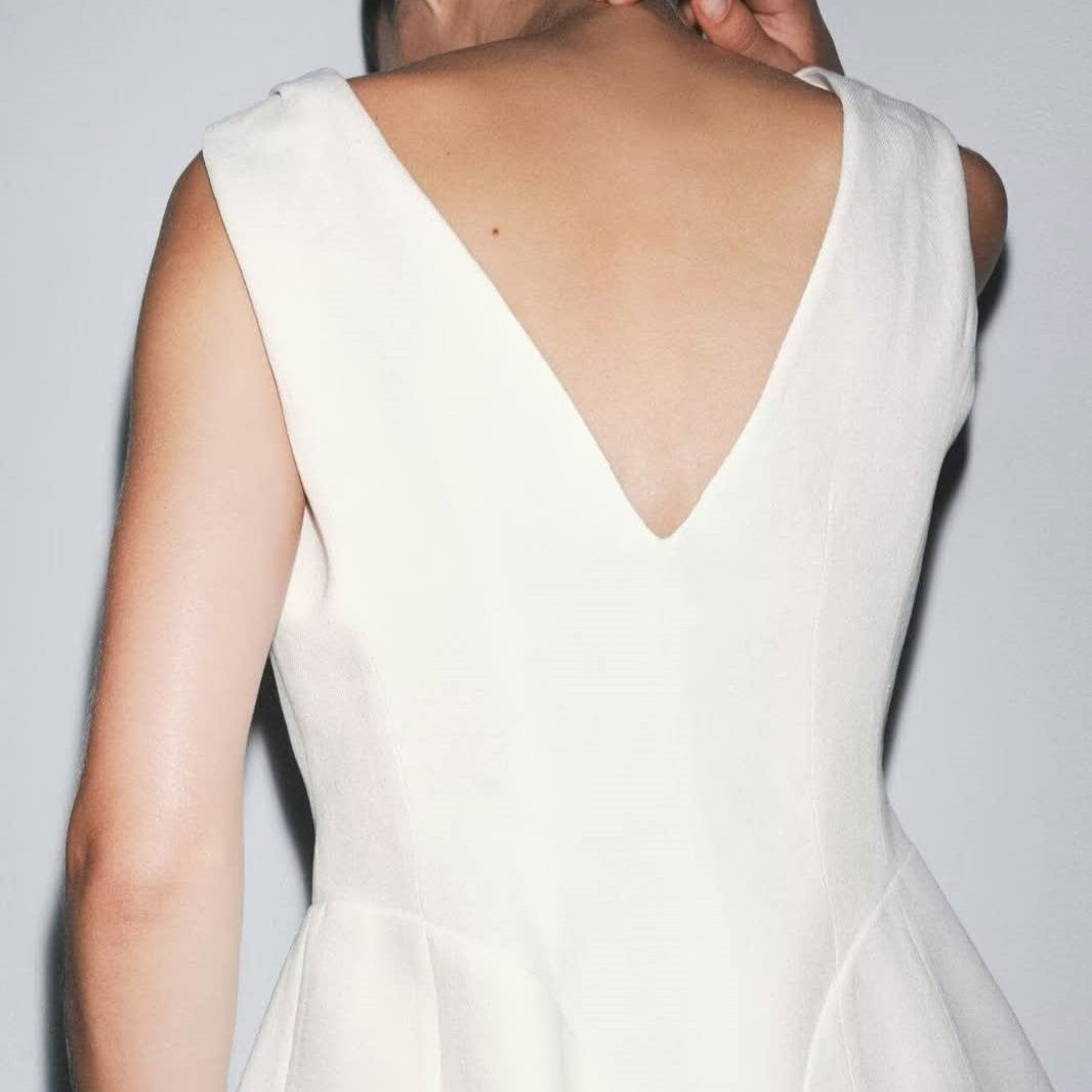 וסט נשים פשתן מחויט עם מפתח V